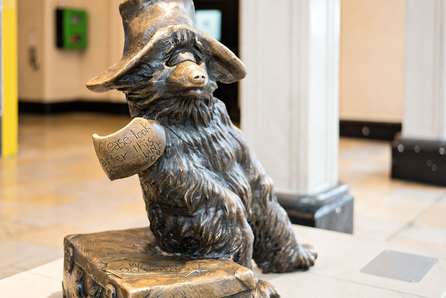https://productionflexioffices.s3.eu-west-1.amazonaws.com/uploads/area_guide_slide/image/254/thumb_Paddington_HiddenGems_Paddington-Bear.jpg